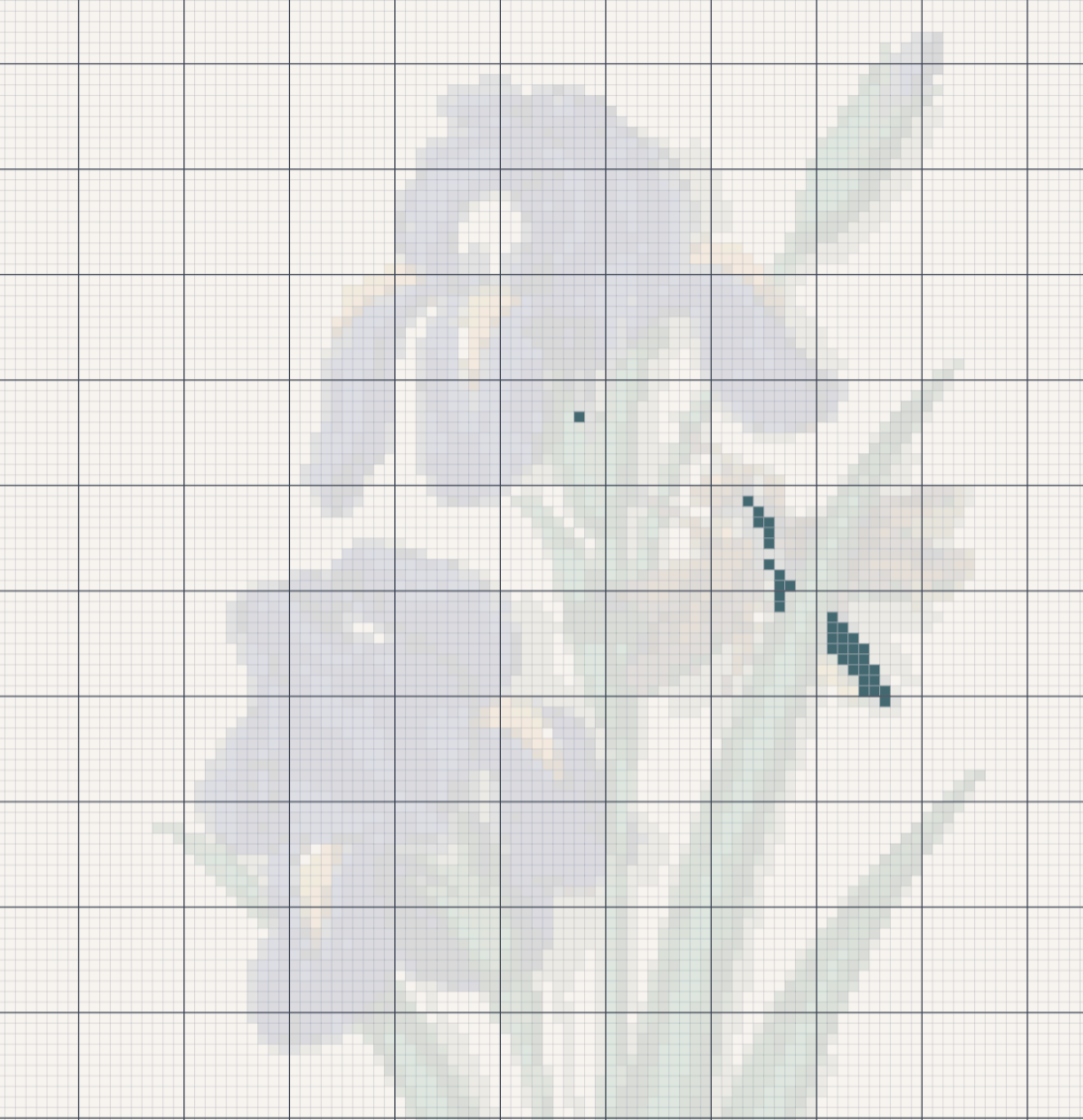 The pattern faded out, with one dark teal colour highlighted in a few stitches on the dragonfly